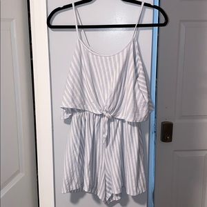 Light blue and white caution to the wind romper